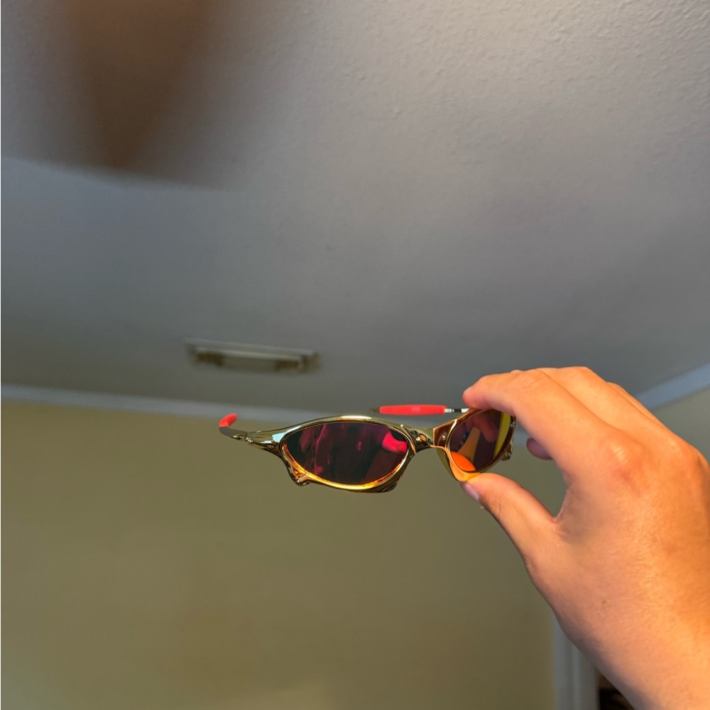 Gold Frame Sunglasses with Red Accents Oakley Oakleys